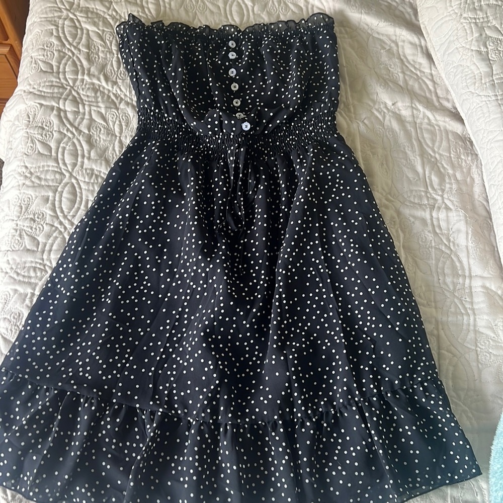 Black polka dot sleeveless dress